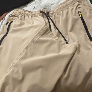 Tan Pants with Black Zipper Accents